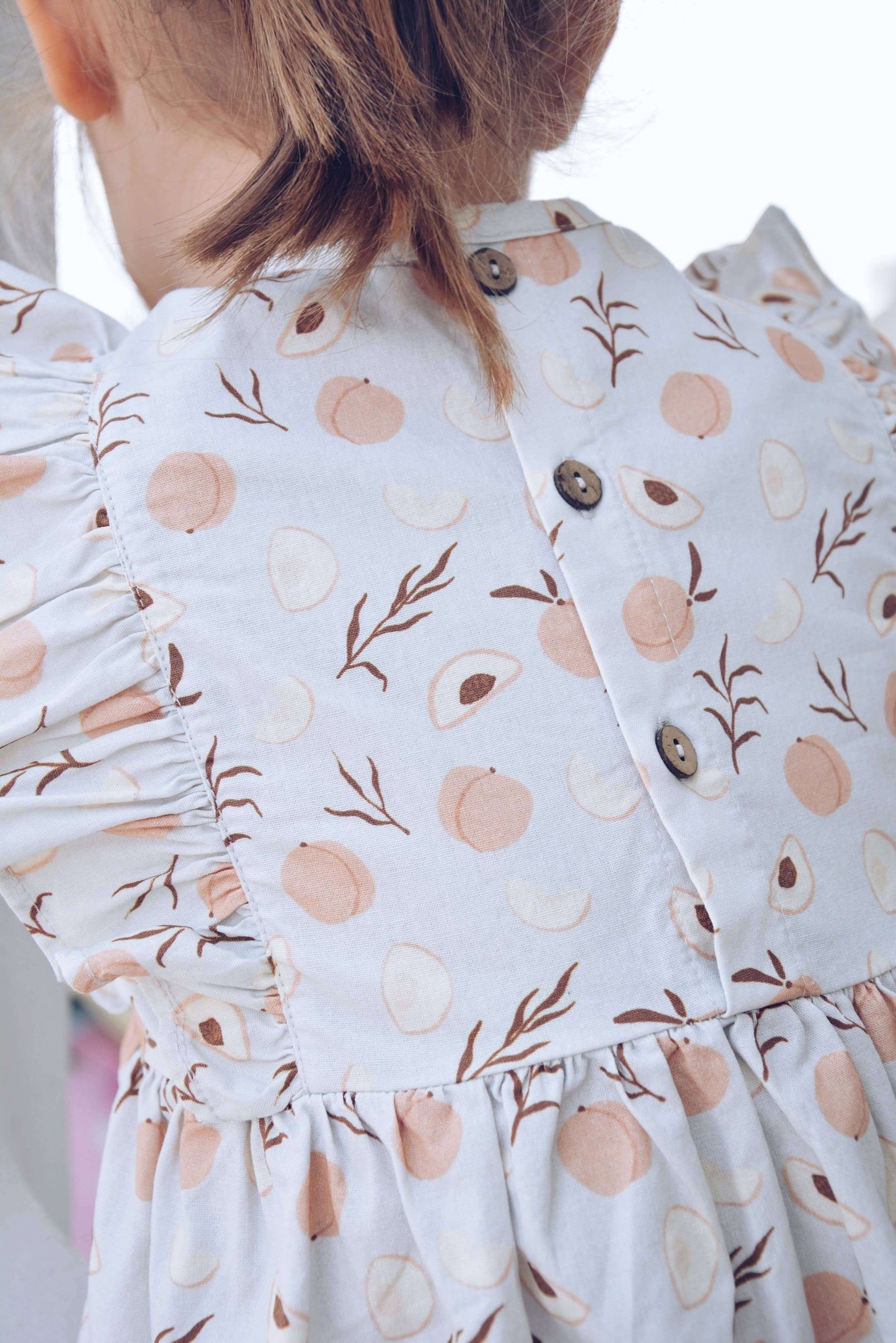 Blue with Peach Pattern, Ruffles & Coconut Buttons